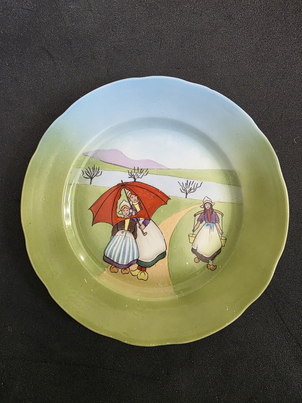 Decorative Hand-Painted Ceramic Plate with Dutch Girl Scene - Green & Blue